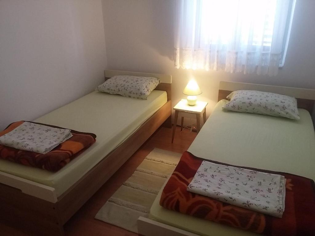 Postel nebo postele na pokoji v ubytování Guesthouse Dante