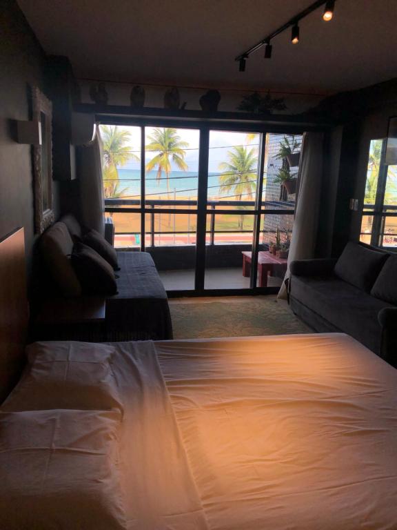 Una cama o camas en una habitación de Marinas Flat Cabo Branco