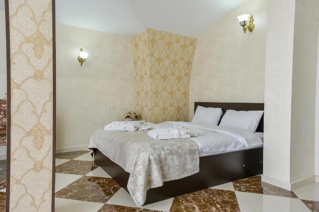 Postel nebo postele na pokoji v ubytování MariaLuis Hotel