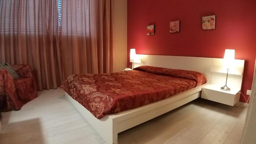 Postel nebo postele na pokoji v ubytování Cavalieri del Tau
