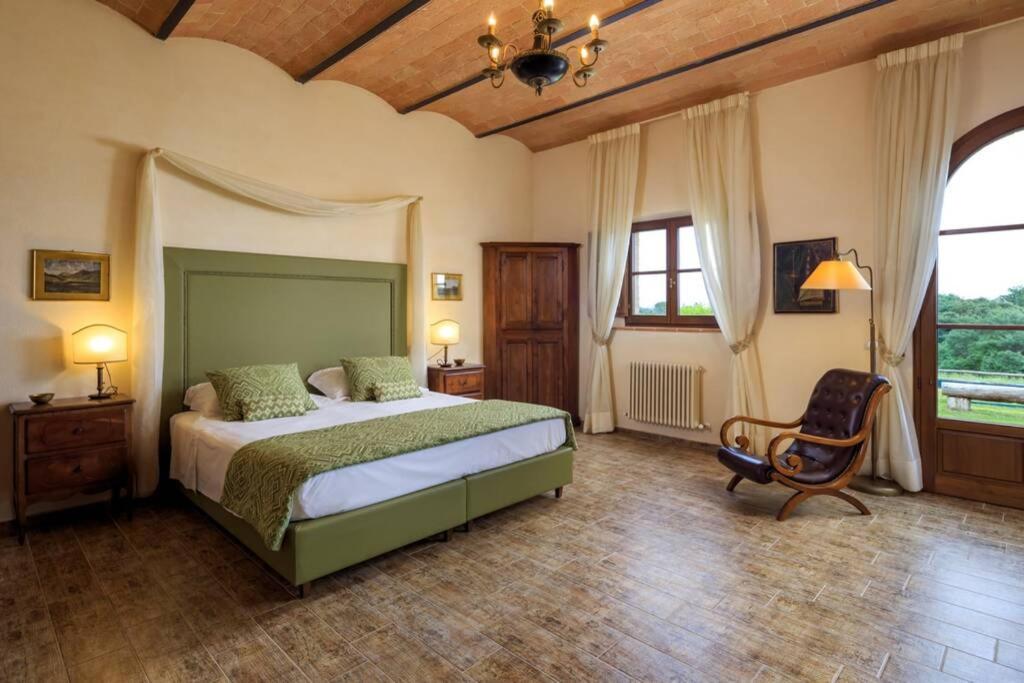 A bed or beds in a room at Podere Maiano - Private pool villa with spa