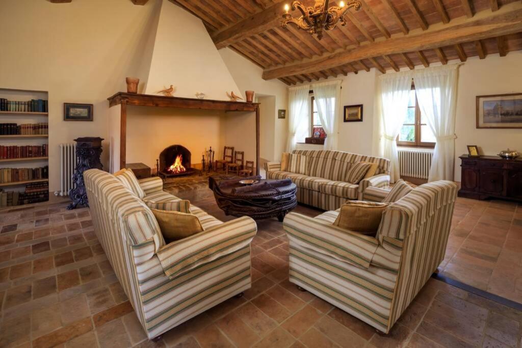 A seating area at Podere Maiano - Private pool villa with spa