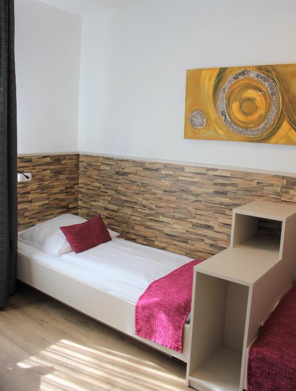 Postel nebo postele na pokoji v ubytování Am Blumenhaus