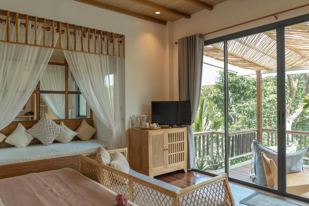 TV a/nebo společenská místnost v ubytování The Spa Koh Chang Resort