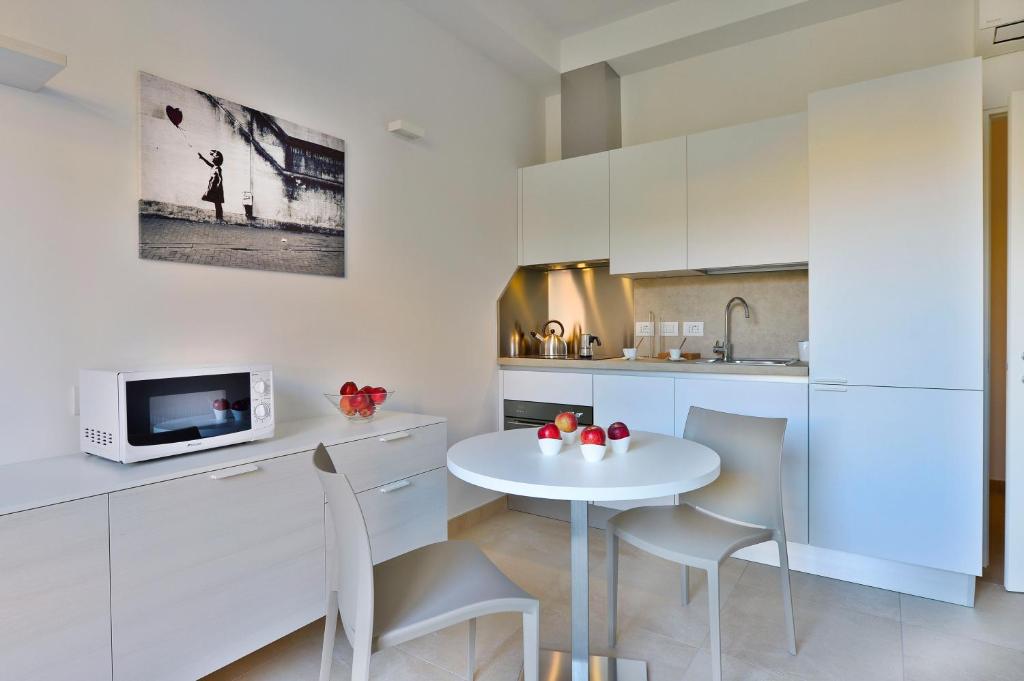 A kitchen or kitchenette at UR-NEST Galleria del Toro