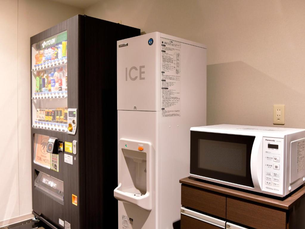 Kuchyň nebo kuchyňský kout v ubytování Wakoshi Tobu Hotel