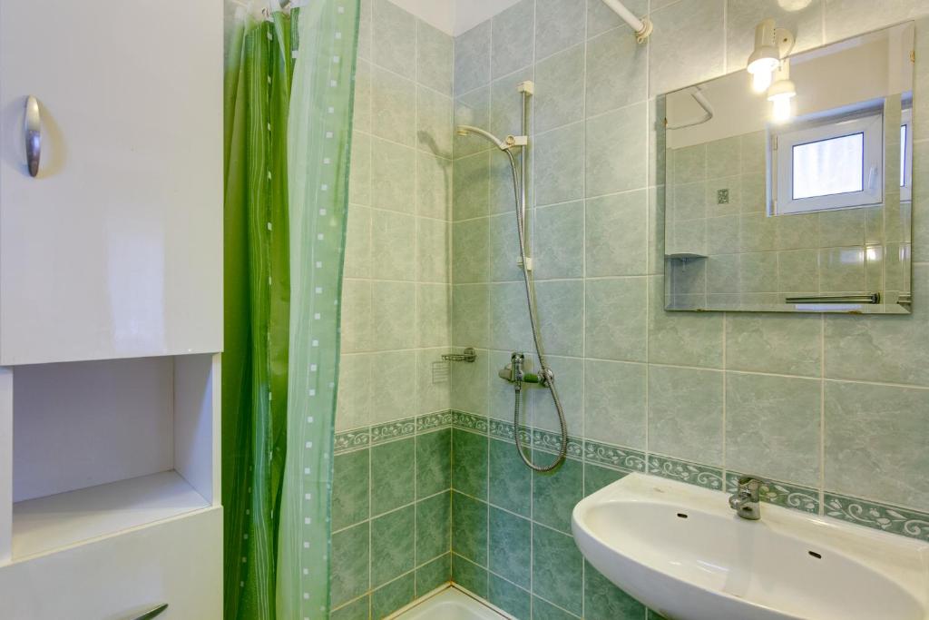Kúpeľňa v ubytovaní Gyapay Apartman Hévíz
