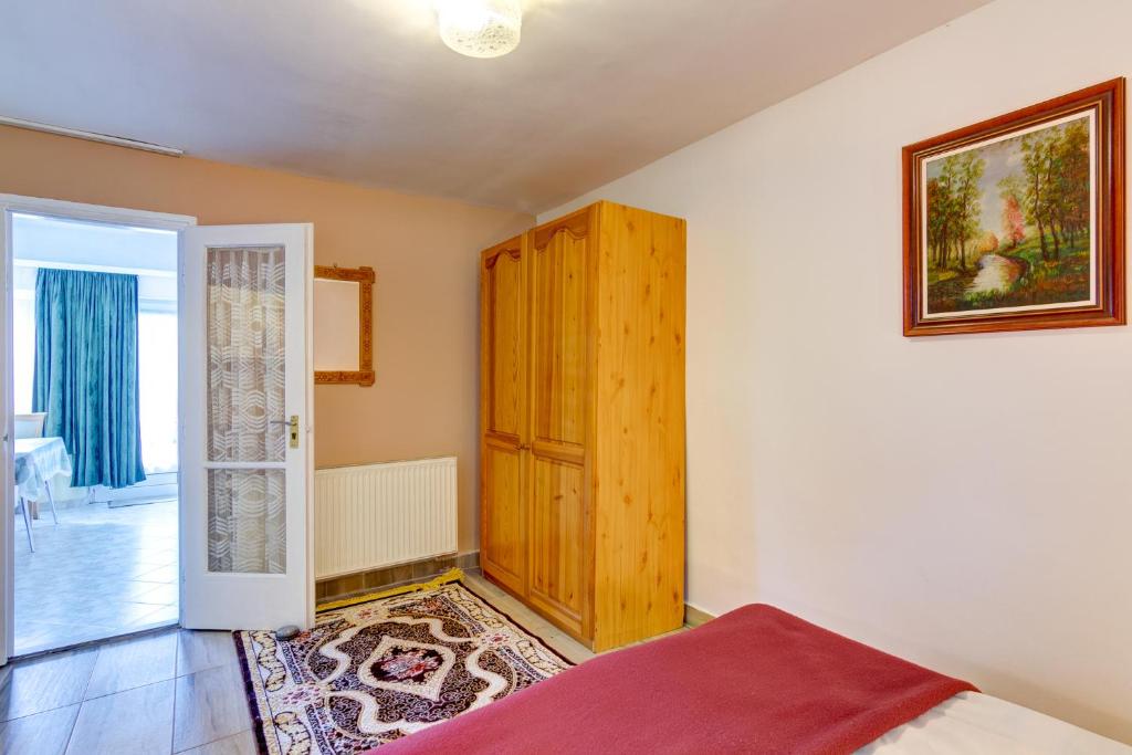 Posteľ alebo postele v izbe v ubytovaní Gyapay Apartman Hévíz