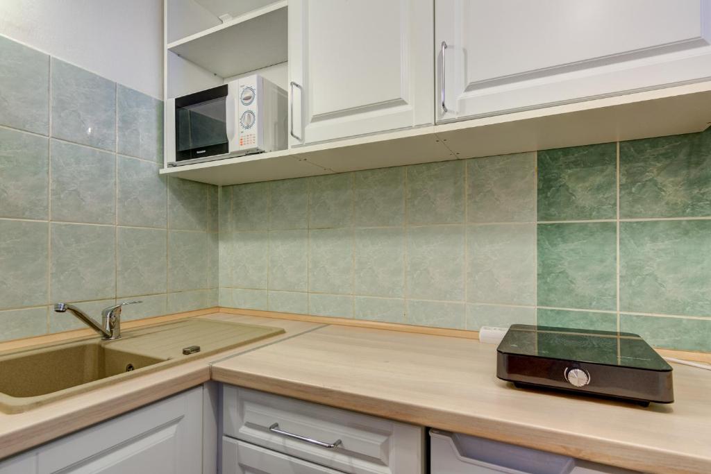 Kuchyňa alebo kuchynka v ubytovaní Gyapay Apartman Hévíz