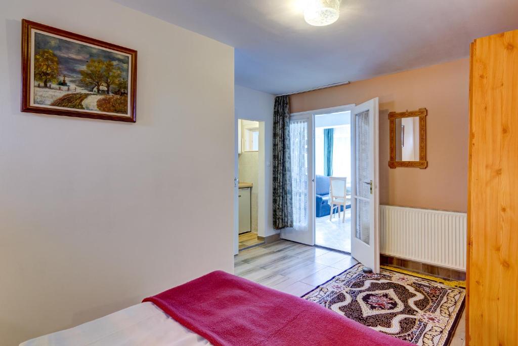 Posteľ alebo postele v izbe v ubytovaní Gyapay Apartman Hévíz