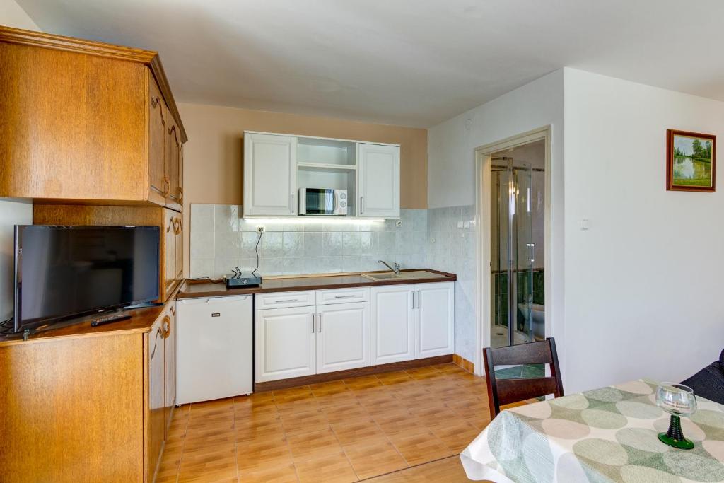 Kuchyňa alebo kuchynka v ubytovaní Gyapay Apartman Hévíz