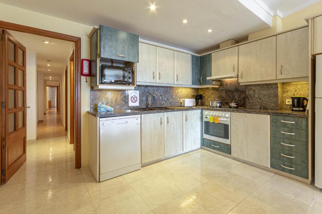 Kuchyň nebo kuchyňský kout v ubytování Apartamento DANIELA