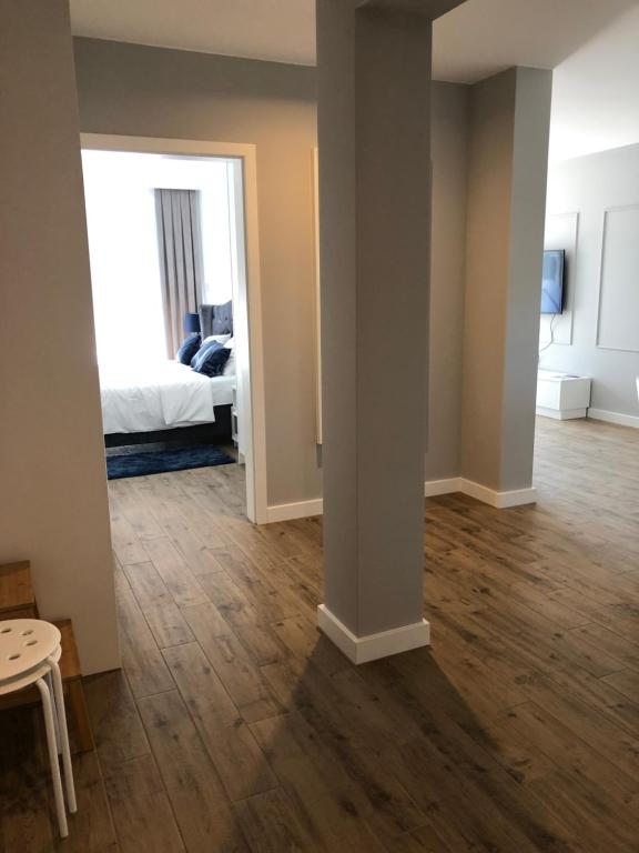 Łóżko lub łóżka w pokoju w obiekcie Apartamenty Klifowa