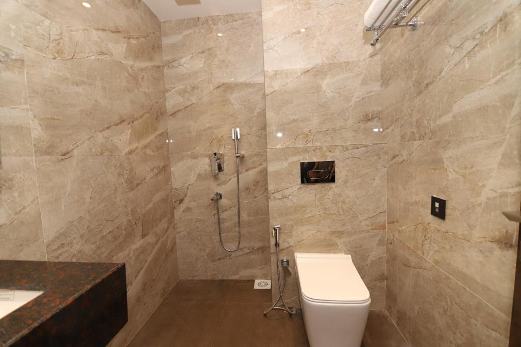 Koupelna v ubytování ECONEST HOTEL