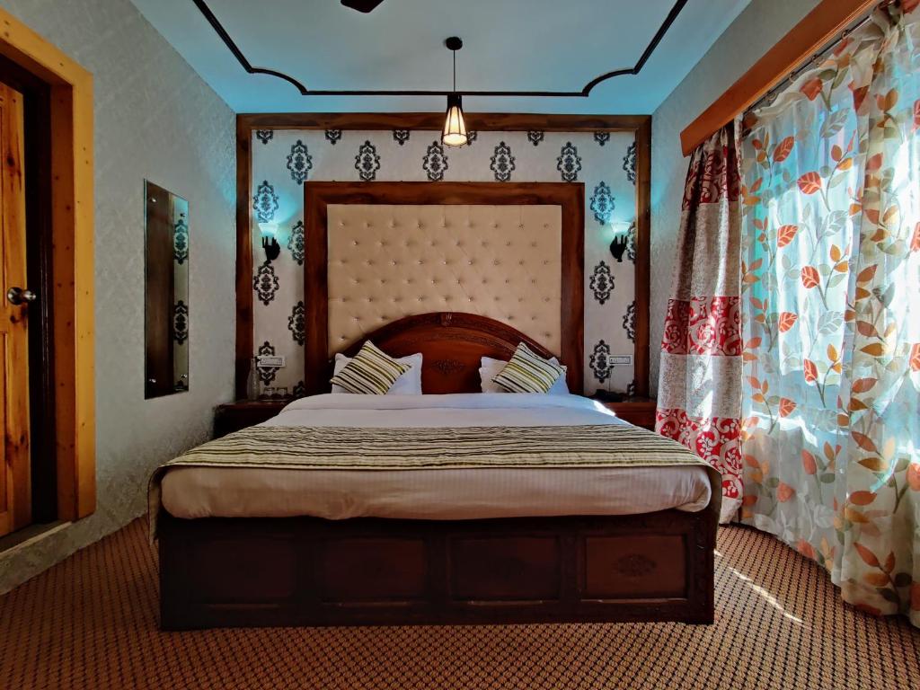 Postel nebo postele na pokoji v ubytování The Shelter Heritage A Boutique Hotel
