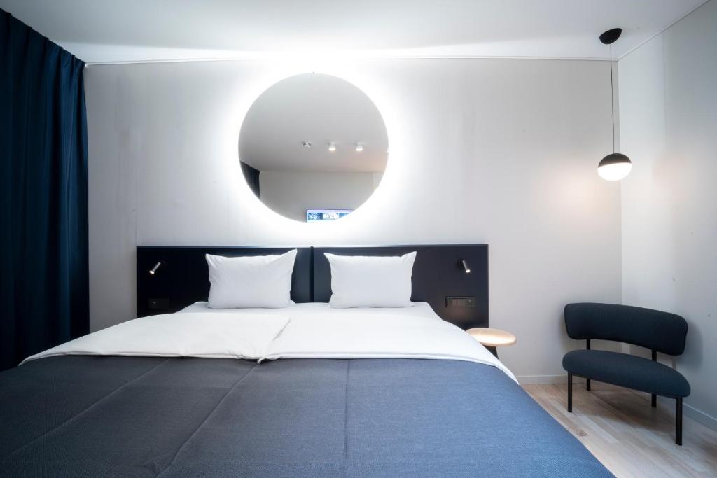 Postel nebo postele na pokoji v ubytování Quality Hotel Strawberry Arena