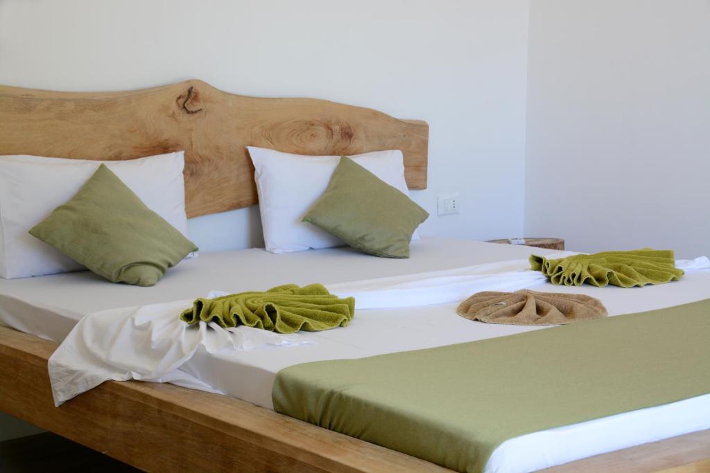 Postel nebo postele na pokoji v ubytování La Base Hotel