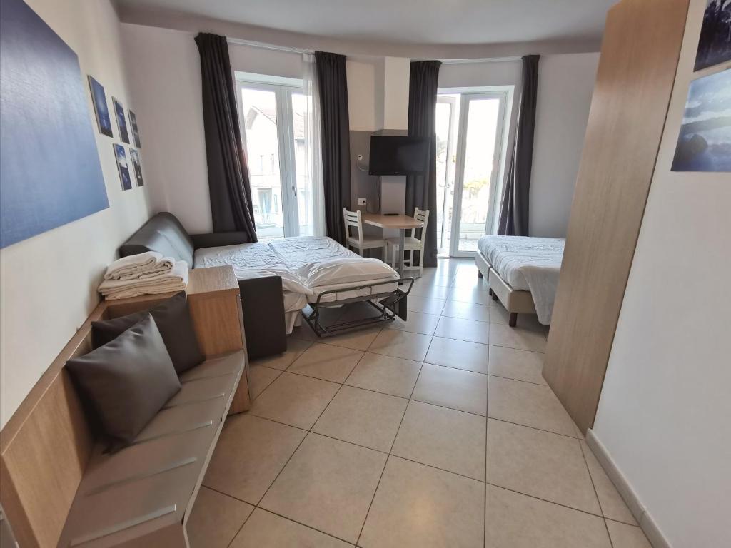 Postel nebo postele na pokoji v ubytování Hotel Oceanomare
