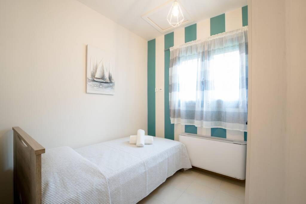 Postel nebo postele na pokoji v ubytování Onore