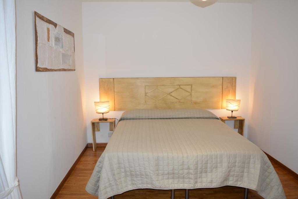 Postel nebo postele na pokoji v ubytování OLASPRI