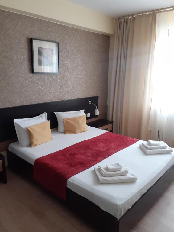 Postel nebo postele na pokoji v ubytování Hotel Nord