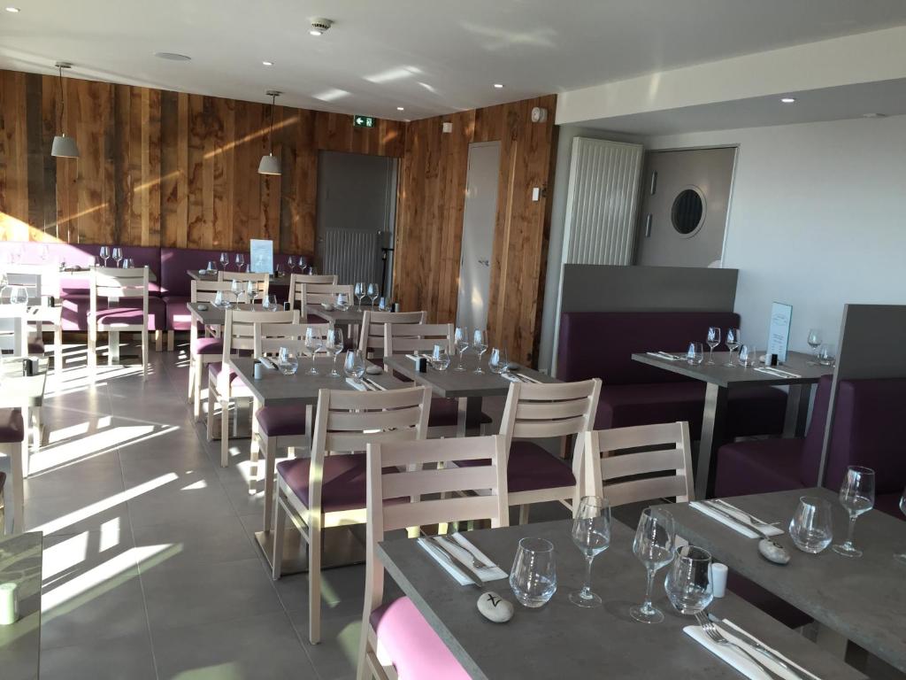 Posezení v ubytování Hotel Les Galets Bleus