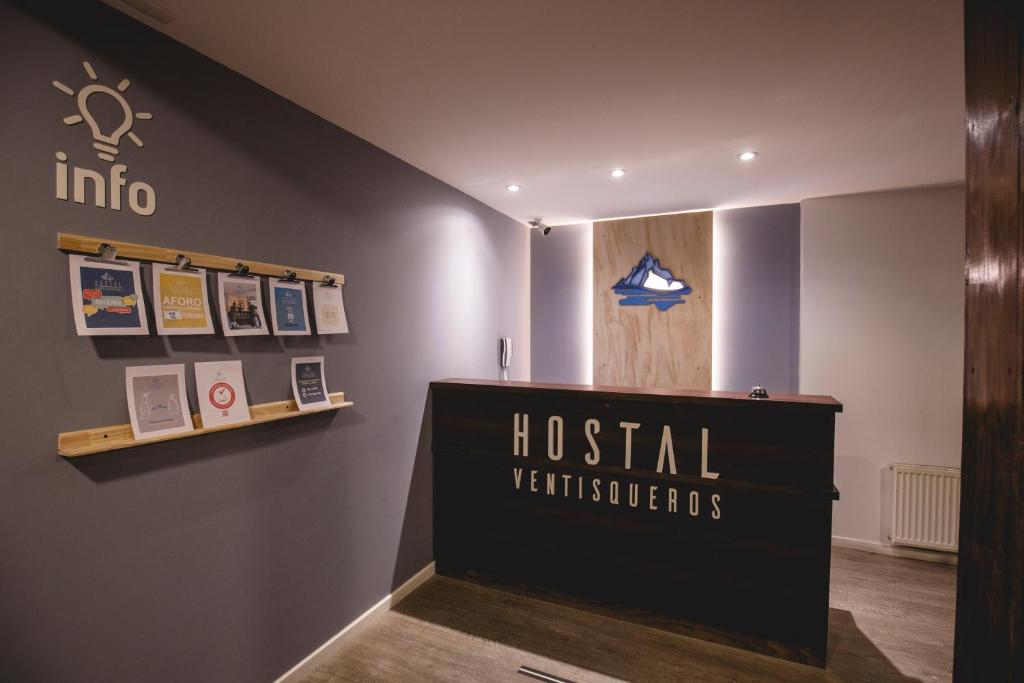 a museum exhibit with a sign that reads hospital vehicles at Hostal Ventisqueros in Punta Arenas