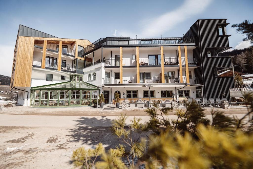 a rendering of a building with a beach at Turmchalet in Braies