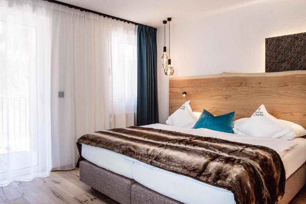 Postel nebo postele na pokoji v ubytování Turmchalet