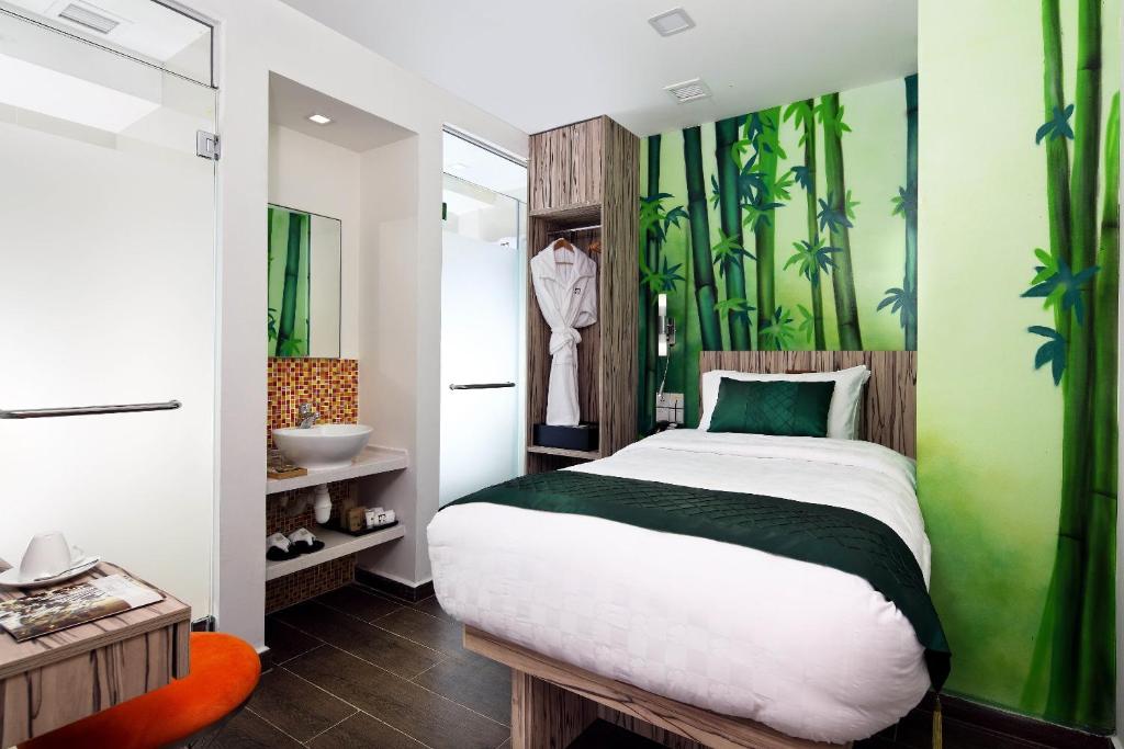 Кровать или кровати в номере Hotel Clover The Arts