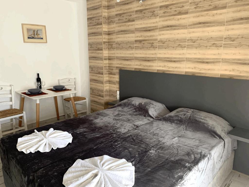 Letto o letti in una camera di Polykratis Rooms