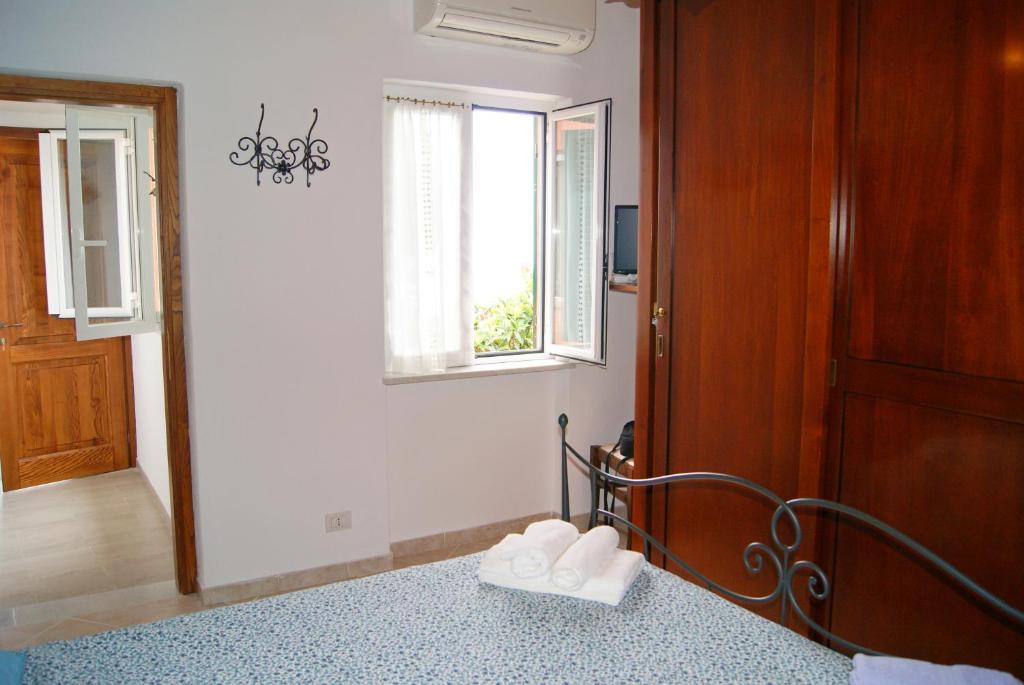 Postel nebo postele na pokoji v ubytování Chez Il Pino Vernazza vista mare