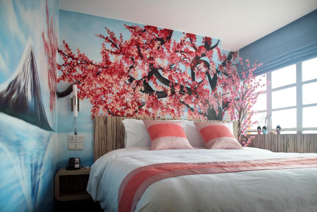 Кровать или кровати в номере Hotel Clover The Arts