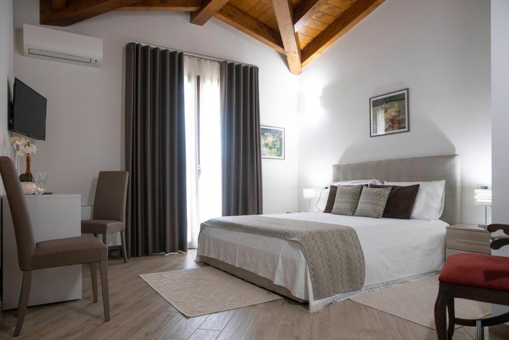 Postel nebo postele na pokoji v ubytování Irilor Luxury B&B