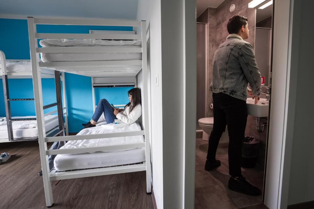Postel nebo postele na pokoji v ubytování Nyon Hostel