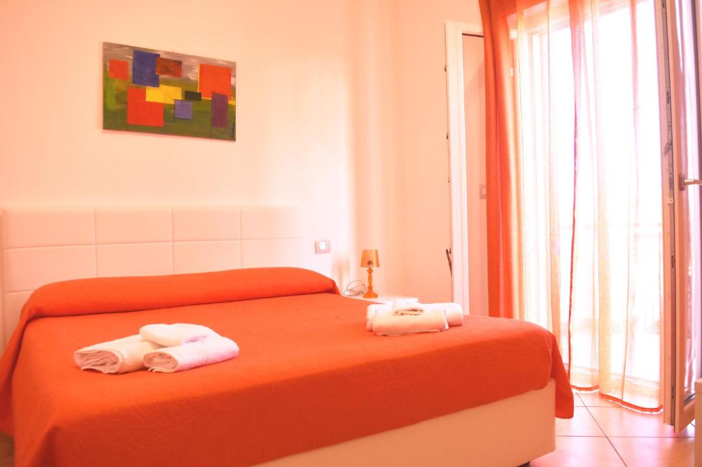 Posteľ alebo postele v izbe v ubytovaní Bed & Breakfast Domus Pepe Scalea