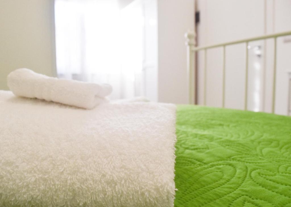 Letto o letti in una camera di Bed & Breakfast Domus Pepe Scalea