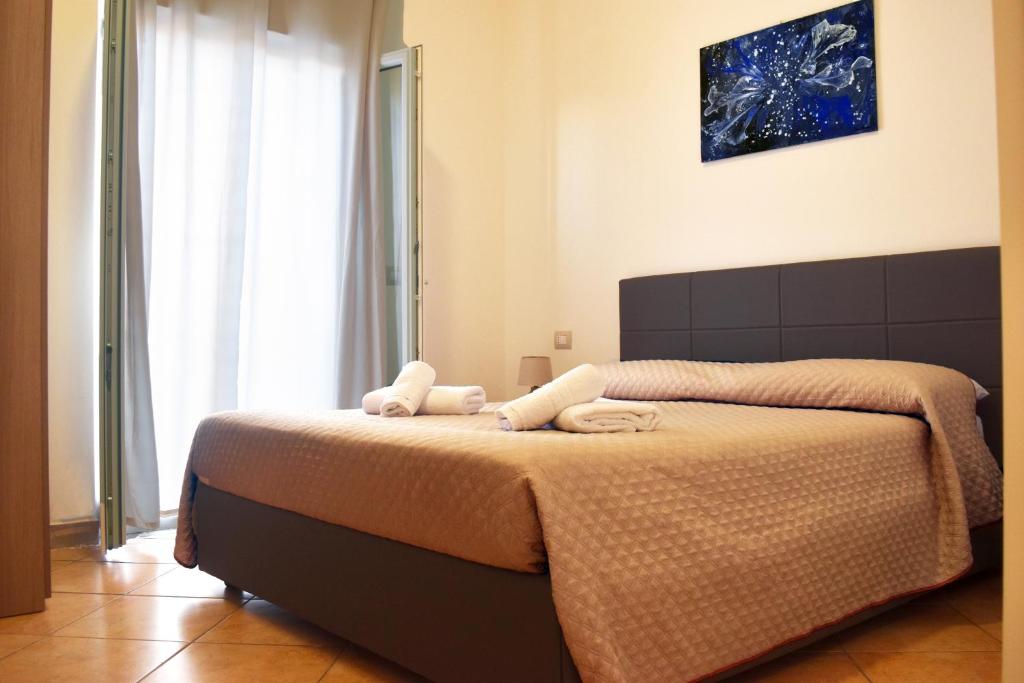 Letto o letti in una camera di Bed & Breakfast Domus Pepe Scalea