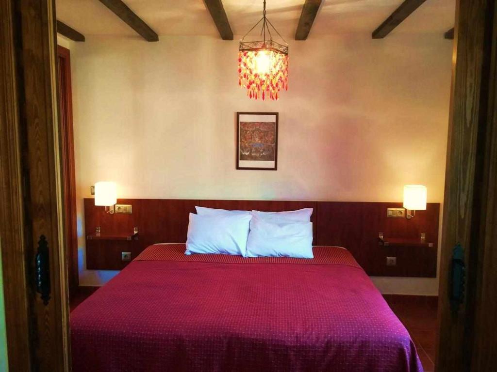 Postel nebo postele na pokoji v ubytování Casa Rural FranciaQuilamas