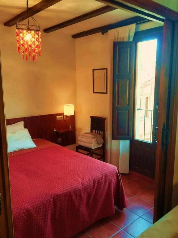 Postel nebo postele na pokoji v ubytování Casa Rural FranciaQuilamas