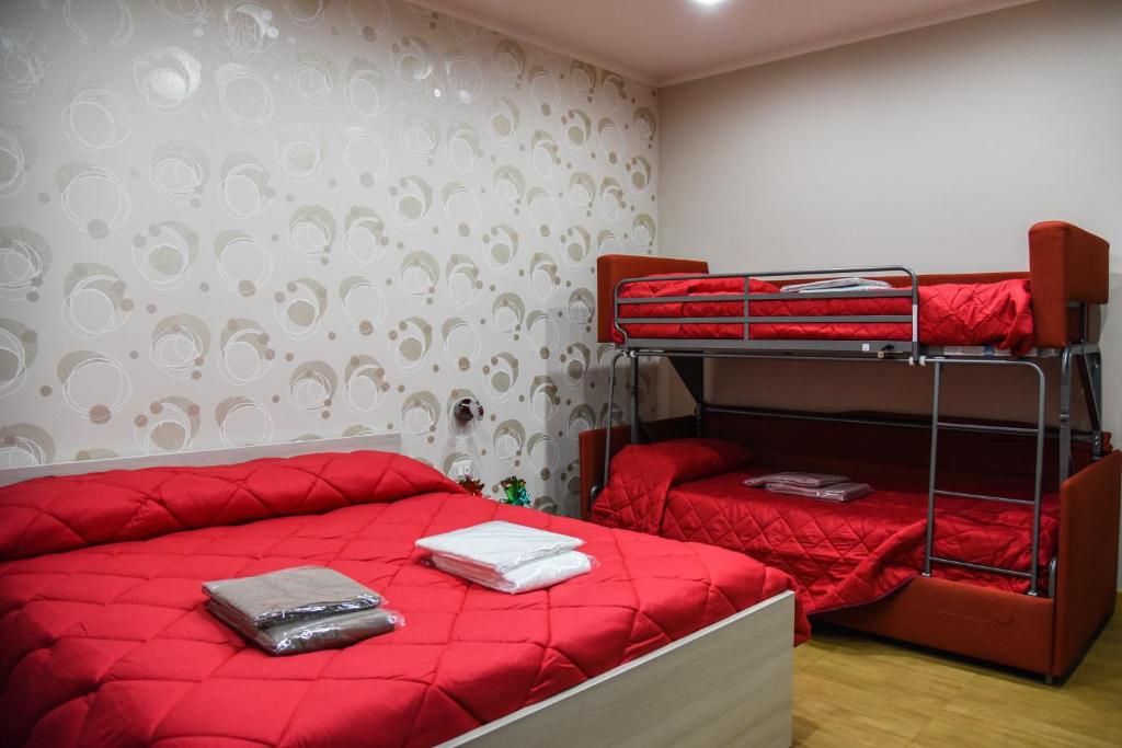 Postel nebo postele na pokoji v ubytování Margherita 2.0