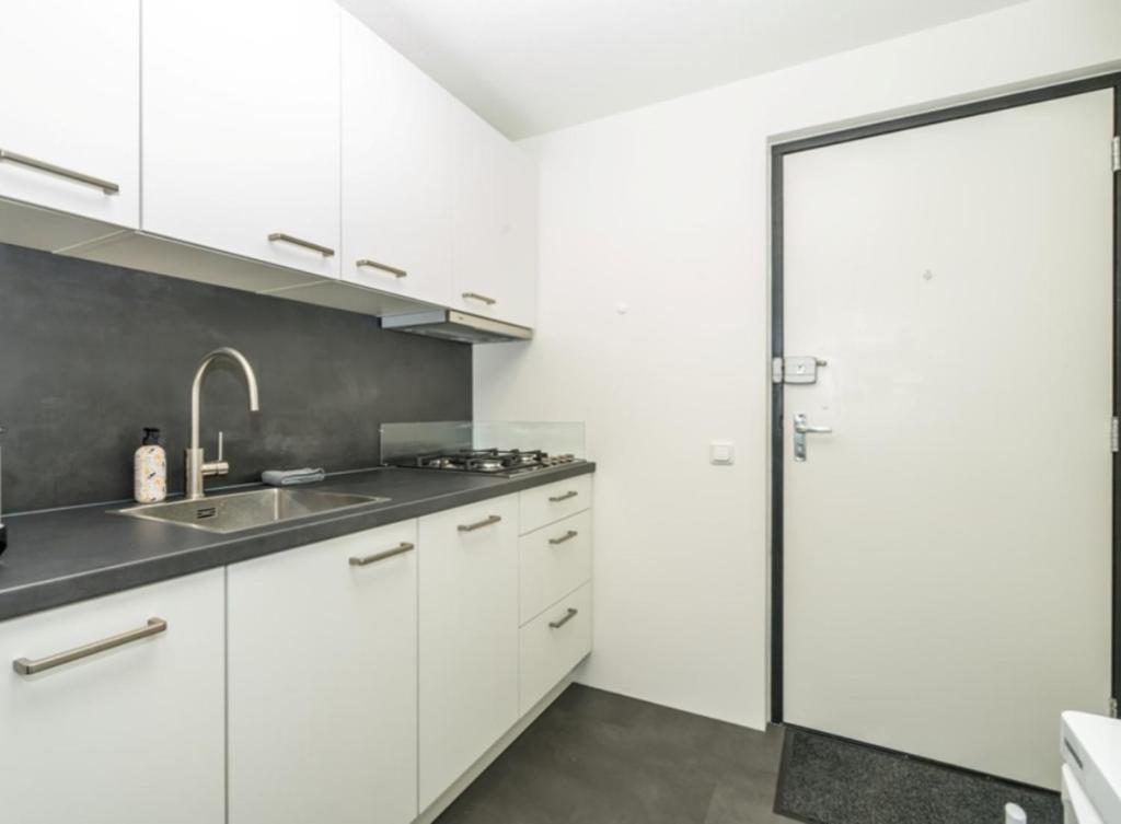 Kuchyň nebo kuchyňský kout v ubytování Appartement Bru 251