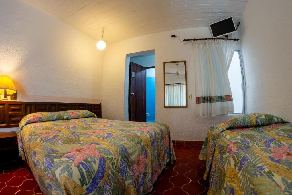TV a/nebo společenská místnost v ubytování Hotel Delfin