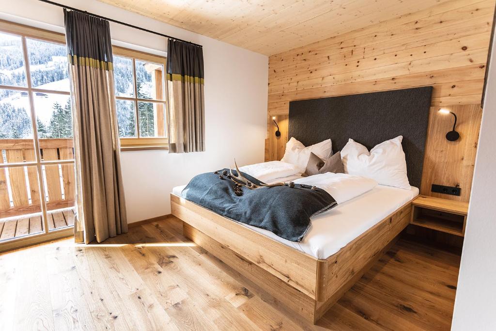 Posteľ alebo postele v izbe v ubytovaní Bergseegut Chalet und Apartment