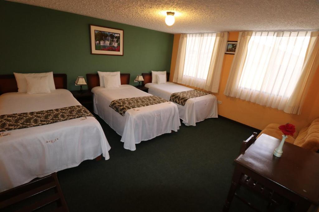 Postel nebo postele na pokoji v ubytování La Posada del Colca