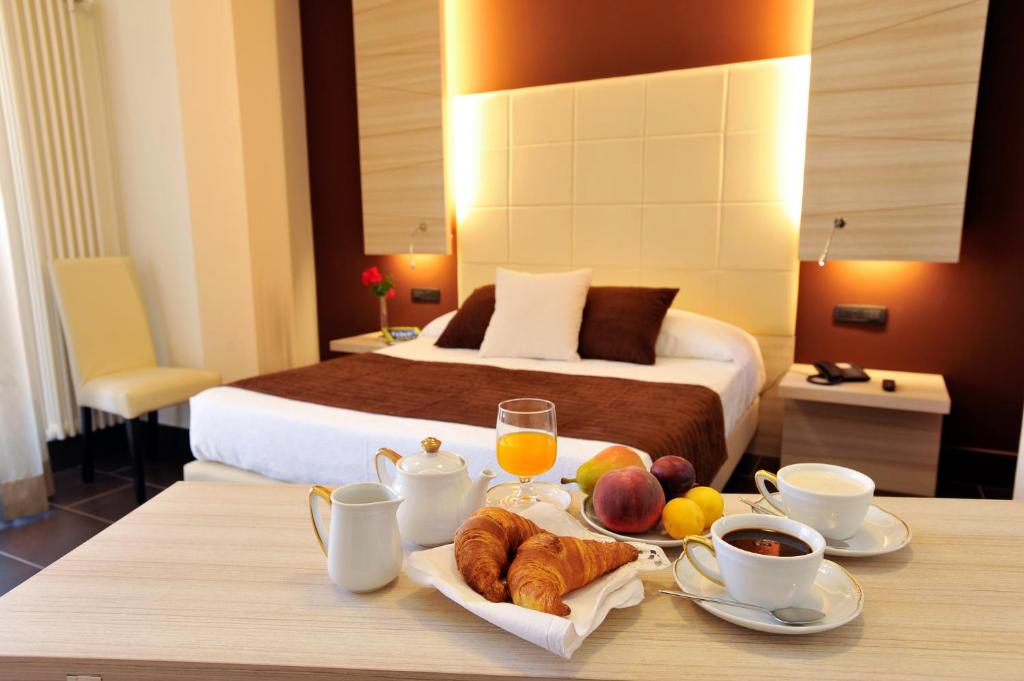 Posteľ alebo postele v izbe v ubytovaní Excelsior Hotel E Appartamenti