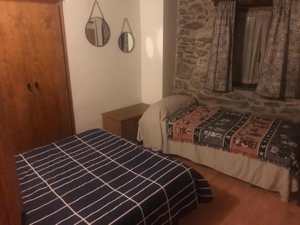 Postel nebo postele na pokoji v ubytování Roch Hotel