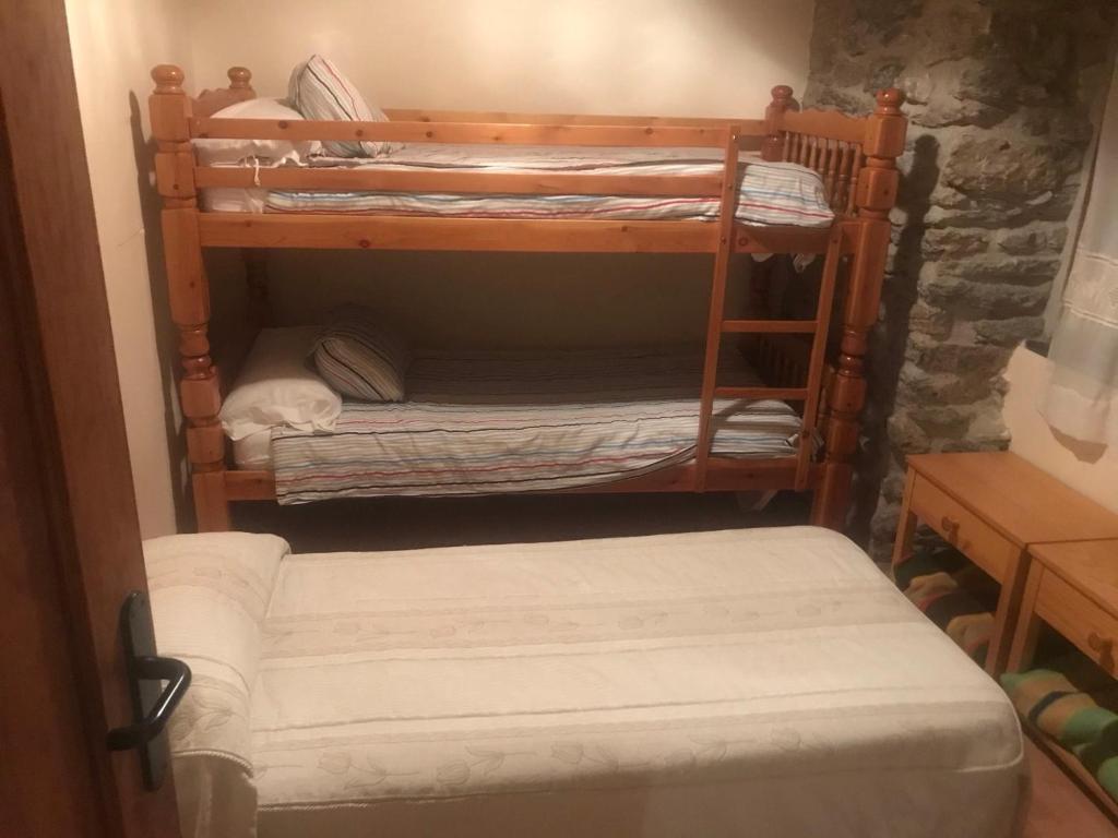 Postel nebo postele na pokoji v ubytování Roch Hotel
