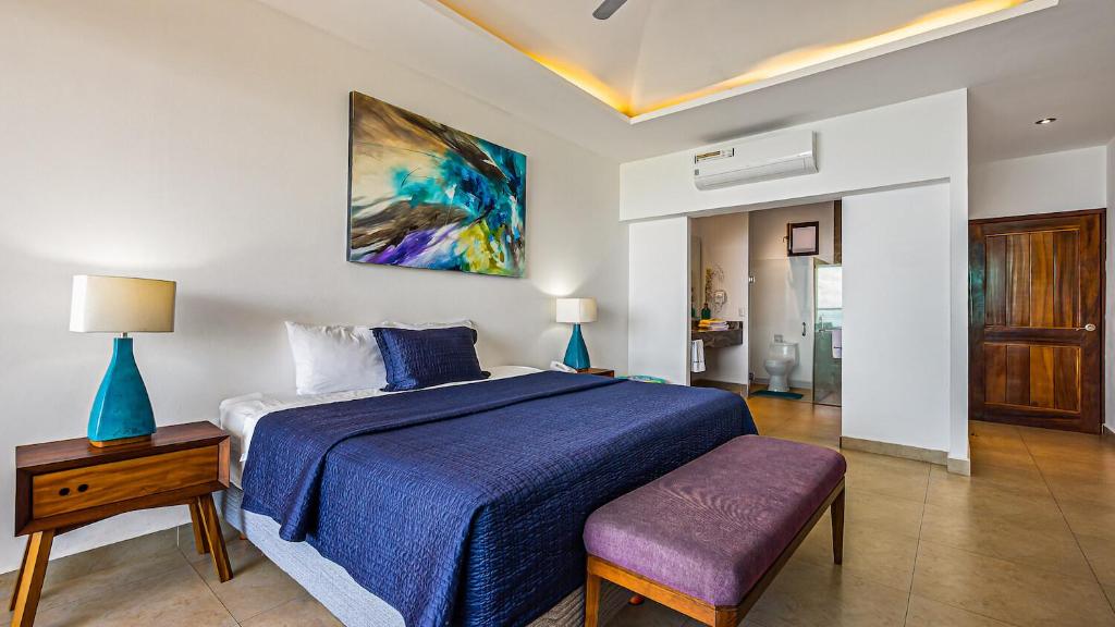 Postel nebo postele na pokoji v ubytování Marboka Hotel & Suites