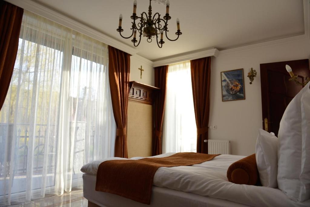 Postel nebo postele na pokoji v ubytování Gránit Villa